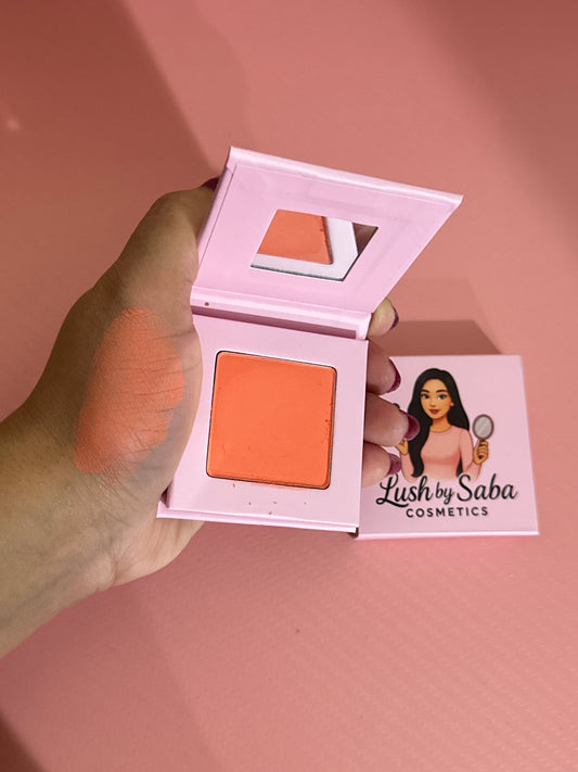 Powder blush in Peach Me shade for a warm, peachy finish