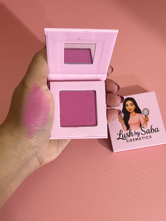 Powder blush in Rosewood Glow shade for a rich rosy-brown tone