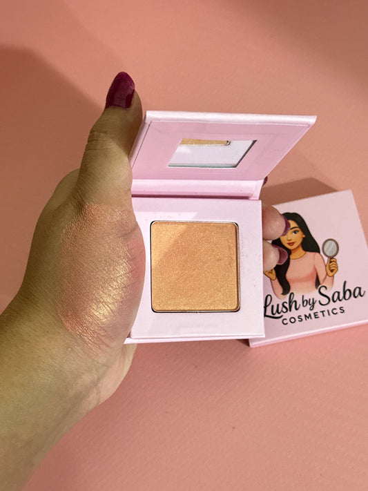 Shimmery powder blush in Glow On shade for a radiant glow